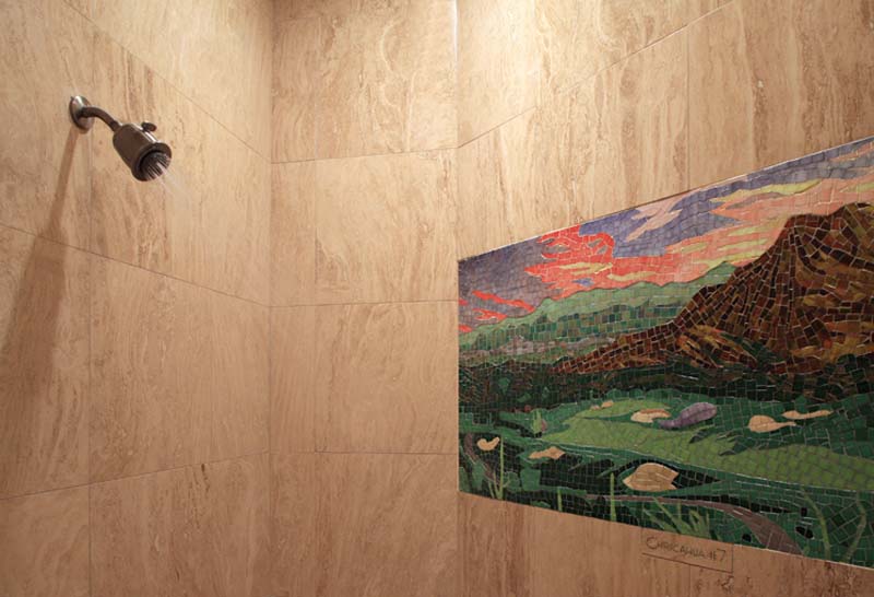 Glass tile mosaic installed in a shower in Arizona.  Design inspired by the golf hole bordering the home.